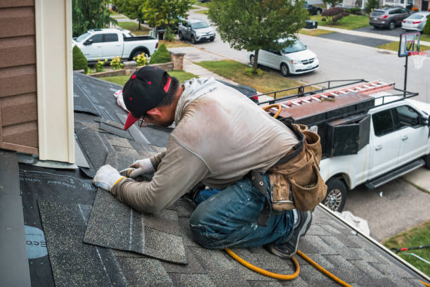 Professional Flat Roof Repair technician working in Melrose, MA